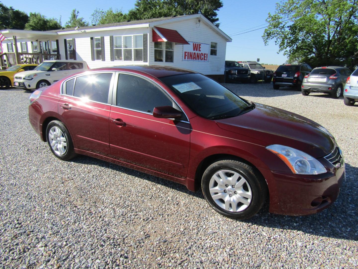 2011 Red /Gray Nissan Altima 2.5 S (1N4AL2AP2BN) with an 2.5L L4 DOHC 16V engine, Automatic transmission, located at 15016 S Hwy 231, Midland City, AL, 36350, (334) 983-3001, 31.306210, -85.495277 - Photo#0